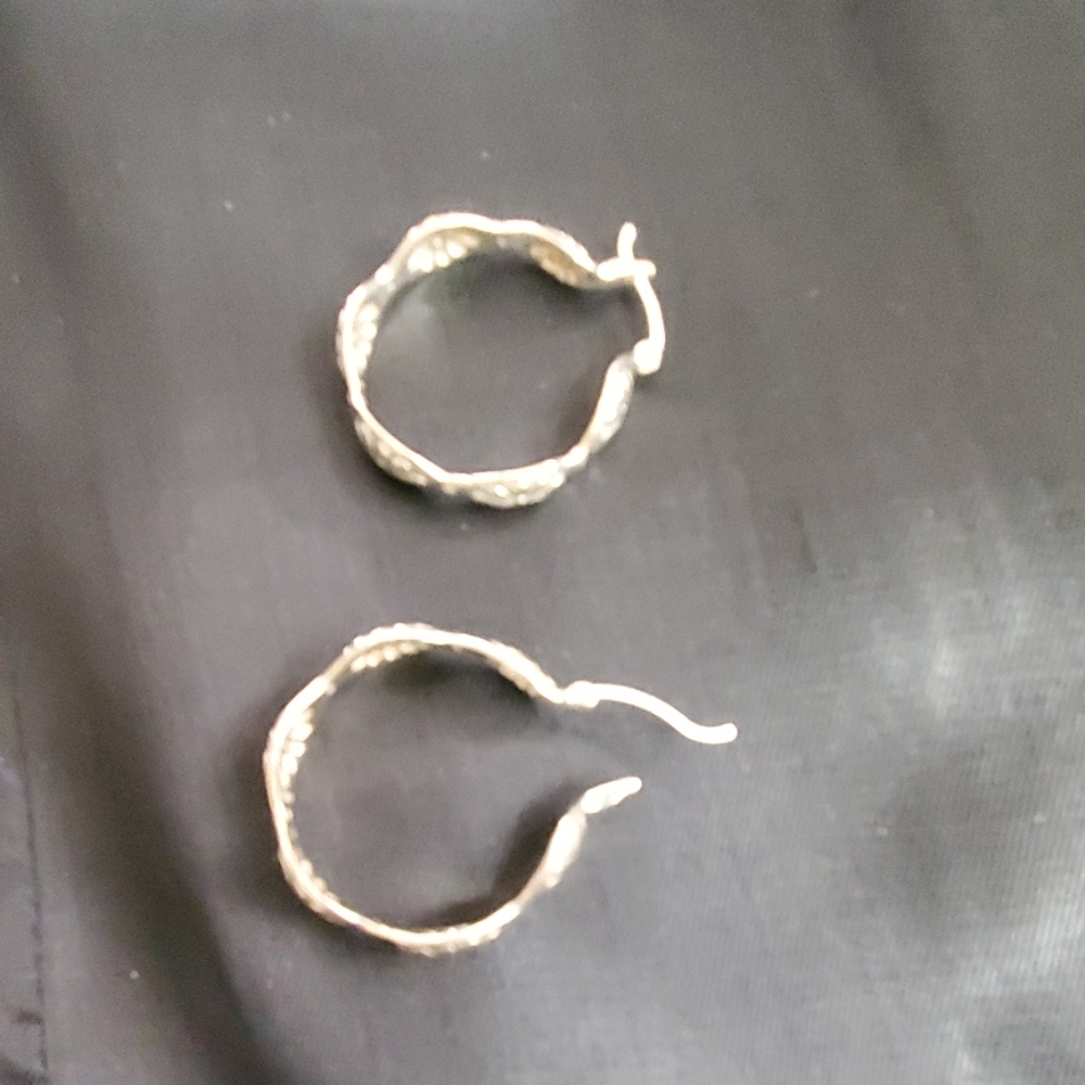 Silver concho shaped earrings